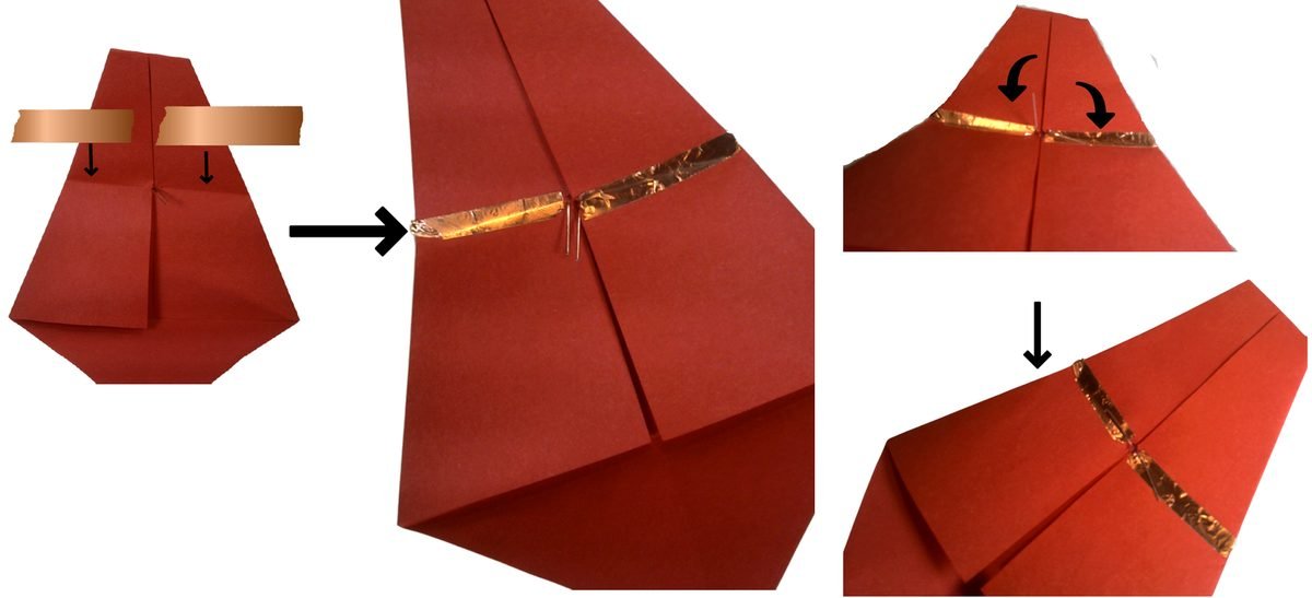 Copper tape strips pressed over each LED leg on either side of the center fold