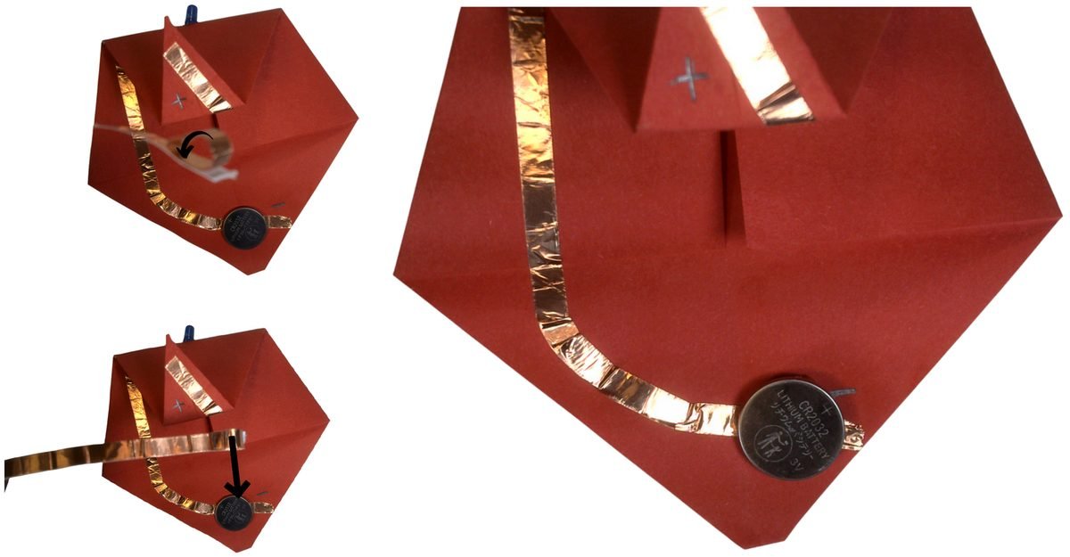 Taping the battery in place under the folded top point